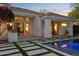 A view of the patio area with direct access to the pool and multiple rooms in the house at 9265 N 115Th St, Scottsdale, AZ 85259