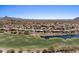 Golf community aerial view highlighting beautiful homes and the well-maintained golf course at 9432 N Longfeather --, Fountain Hills, AZ 85268