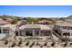 Aerial view of a backyard featuring a pool, patio, and seating area; golf course community at 9432 N Longfeather --, Fountain Hills, AZ 85268