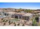 Beautiful aerial view of a backyard featuring a pool, patio, and desert landscaping at 9432 N Longfeather --, Fountain Hills, AZ 85268