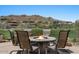 Back patio with a fire pit and beautiful green spaces beyond the fence at 9432 N Longfeather --, Fountain Hills, AZ 85268