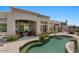 An attractive backyard with pool, patio and outdoor kitchen at 9432 N Longfeather --, Fountain Hills, AZ 85268