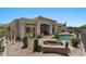 Beautiful backyard with a pool, hot tub, and desert landscaping at 9432 N Longfeather --, Fountain Hills, AZ 85268