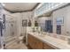 Bathroom featuring tile countertops, neutral cabinets, and shower over tub at 9432 N Longfeather --, Fountain Hills, AZ 85268