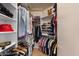 Walk-in closet with ample storage, shelving, and hanging rods at 9432 N Longfeather --, Fountain Hills, AZ 85268