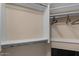 Organized closet featuring shelving, a hanging rod, and a beige interior at 9432 N Longfeather --, Fountain Hills, AZ 85268