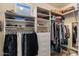 Well-organized walk-in closet with shelving, drawers, and hanging space at 9432 N Longfeather --, Fountain Hills, AZ 85268