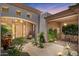 Captivating home entrance featuring stylish architectural details and desert-themed landscaping at 9432 N Longfeather --, Fountain Hills, AZ 85268