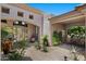 Captivating home entrance featuring stylish architectural details and desert-themed landscaping at 9432 N Longfeather --, Fountain Hills, AZ 85268