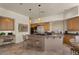 Well-lit kitchen featuring a large island, wooden cabinets, and stainless steel appliances, great for cooking at 9432 N Longfeather --, Fountain Hills, AZ 85268