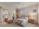 Cozy main bedroom features natural light, ensuite bathroom, and closet at 9432 N Longfeather --, Fountain Hills, AZ 85268