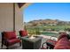 Comfortable outdoor seating with a fire pit overlooking desert landscape at 9432 N Longfeather --, Fountain Hills, AZ 85268