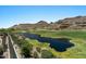 Scenic view of a pond and desert landscape at 9432 N Longfeather --, Fountain Hills, AZ 85268