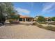 Large backyard with desert landscaping and a decorative fountain at 9813 W Mcrae Way, Peoria, AZ 85382