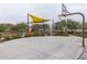 Outdoor recreational basketball court with visible hoop in a neighborhood park at 9922 E Thunderbolt Ave, Mesa, AZ 85212