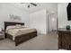 Bright bedroom featuring a spacious layout, neutral colors, and ample closet space at 9922 E Thunderbolt Ave, Mesa, AZ 85212