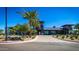 Community clubhouse exterior showcasing modern architecture and landscaping, creating an inviting space at 9922 E Thunderbolt Ave, Mesa, AZ 85212