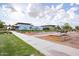 Well-maintained community grounds with lush landscaping, walking paths, and benches for a peaceful outdoor environment at 9922 E Thunderbolt Ave, Mesa, AZ 85212