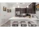 Bright, modern kitchen with stainless steel appliances and bar stool seating at 9922 E Thunderbolt Ave, Mesa, AZ 85212