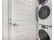 Convenient laundry area with stacked washer and dryer at 9922 E Thunderbolt Ave, Mesa, AZ 85212
