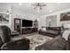 Spacious living room with comfortable seating and ample lighting at 9922 E Thunderbolt Ave, Mesa, AZ 85212