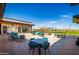 Outdoor patio with ample seating, including tables and chairs, with easy access to the nearby playground for  at 9922 E Thunderbolt Ave, Mesa, AZ 85212