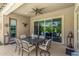 Covered patio with comfortable seating, perfect for outdoor dining and relaxation at 9922 E Thunderbolt Ave, Mesa, AZ 85212