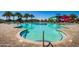 Resort-style pool with water features, slides, and a shallow entry area, perfect for Gathering fun and relaxation at 9922 E Thunderbolt Ave, Mesa, AZ 85212