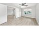 Well-lit bedroom with wood flooring and neutral paint offering a peaceful and serene atmosphere at 1015 E Penny Ln, San Tan Valley, AZ 85140