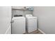 Convenient laundry room equipped with a washer and dryer at 1015 E Penny Ln, San Tan Valley, AZ 85140