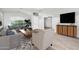 Bright living room featuring modern decor, a large window and an inviting open layout at 1015 E Penny Ln, San Tan Valley, AZ 85140