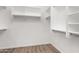 Spacious walk-in closet with built-in shelving and ample storage at 1015 E Penny Ln, San Tan Valley, AZ 85140