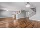 Open floor plan seamlessly connects the living room, dining area, and modern kitchen at 10745 W Taft St, Phoenix, AZ 85037