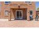Covered patio with ceiling fan and tiled flooring is perfect for relaxing and entertaining outdoors at 10745 W Taft St, Phoenix, AZ 85037