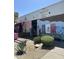 Exterior view of a cafe featuring mural art and outdoor seating on a sunny day at 1110 E Pierce St, Phoenix, AZ 85006