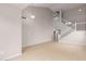 Spacious living room boasting high ceilings, neutral paint, and tile floors at 11132 W Mariposa Dr, Phoenix, AZ 85037