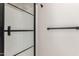 Modern shower features a glass door and sleek fixtures in bathroom at 11132 W Mariposa Dr, Phoenix, AZ 85037