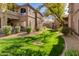 Lush green backyard with views of the property's surroundings in a beautiful community at 11680 E Sahuaro Dr # 1059, Scottsdale, AZ 85259