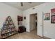 Bedroom featuring tiled floors, neutral walls, and unique shelving decor at 11680 E Sahuaro Dr # 1059, Scottsdale, AZ 85259