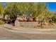 Community sign with lush landscaping, adding charm and curb appeal to this inviting neighborhood at 11680 E Sahuaro Dr # 1059, Scottsdale, AZ 85259