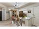 Dining area adjacent to the kitchen with a large window to a view of a private outdoor area at 11680 E Sahuaro Dr # 1059, Scottsdale, AZ 85259
