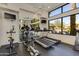 Bright community fitness center with treadmills and equipment, offering residents a convenient workout space with scenic views at 11680 E Sahuaro Dr # 1059, Scottsdale, AZ 85259