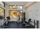 Well-equipped community gym features a variety of exercise machines and natural light, promoting a healthy lifestyle at 11680 E Sahuaro Dr # 1059, Scottsdale, AZ 85259