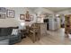 Inviting living room adjacent to breakfast bar, seamlessly blending comfort and style for modern living at 11680 E Sahuaro Dr # 1059, Scottsdale, AZ 85259