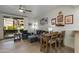 Open concept living room with outdoor access, comfortable seating, and stylish decor at 11680 E Sahuaro Dr # 1059, Scottsdale, AZ 85259