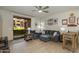 The living room is spacious with a patio door and comfortable furniture at 11680 E Sahuaro Dr # 1059, Scottsdale, AZ 85259