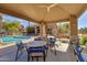 Inviting pool area with covered seating, perfect for relaxing and enjoying the community amenities at 11680 E Sahuaro Dr # 1059, Scottsdale, AZ 85259
