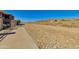 Concrete sidewalk offers beautiful views of native vegetation and neighborhood surroundings at 11680 E Sahuaro Dr # 1059, Scottsdale, AZ 85259