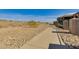 Well-maintained community pathway, providing a scenic route with views of nature and neighborhood surroundings at 11680 E Sahuaro Dr # 1059, Scottsdale, AZ 85259