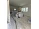 Image of a garage interior filled with building materials, including doors, lumber, and tools at 1210 E Garfield St, Phoenix, AZ 85006